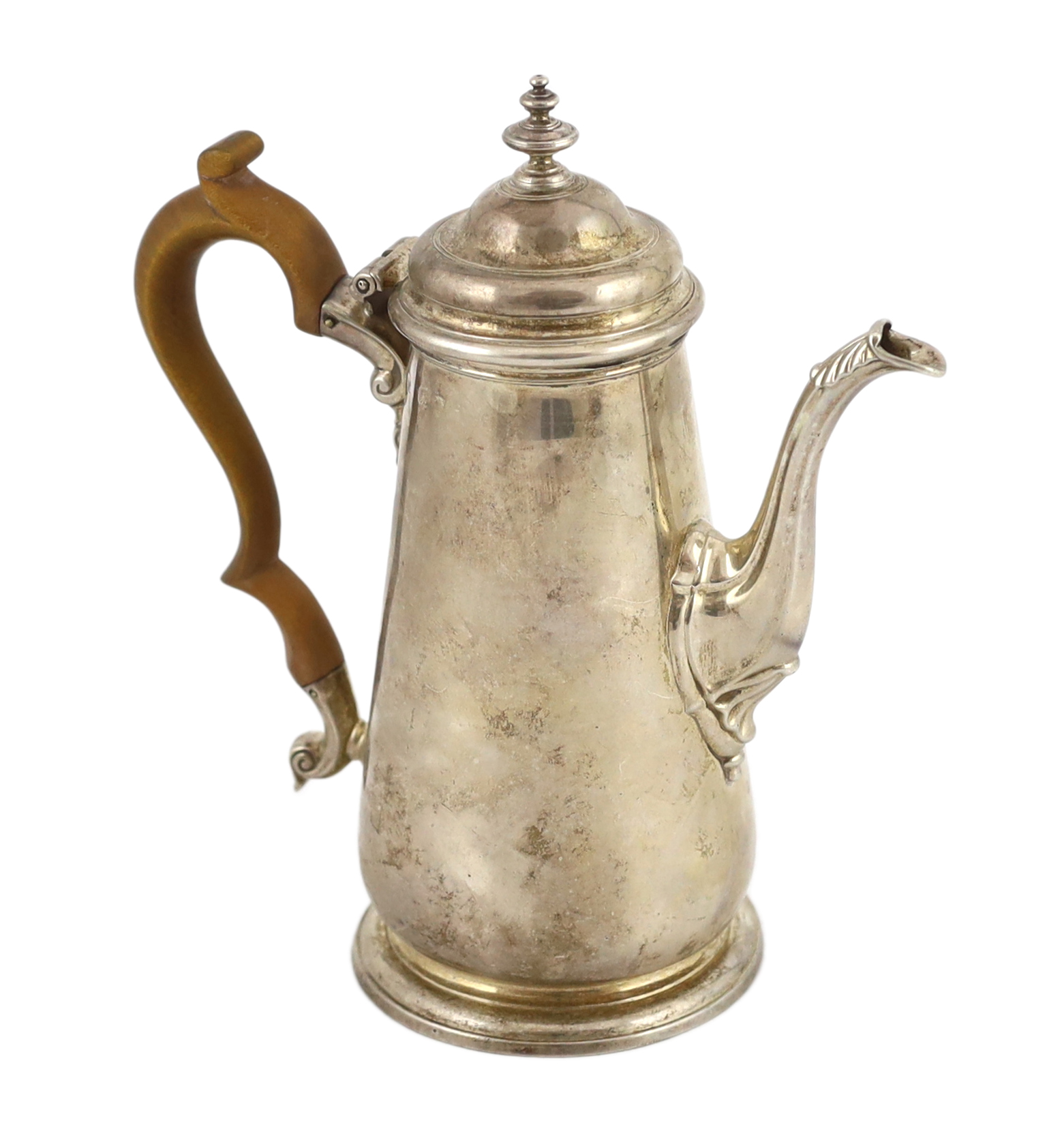 A George II silver coffee pot and hinged cover with turned finial, William Williams I